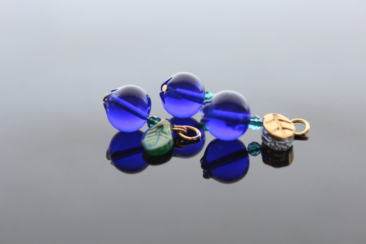 Glass Blueberry charms for jewelry making with silver and gold hooks and glass leaves