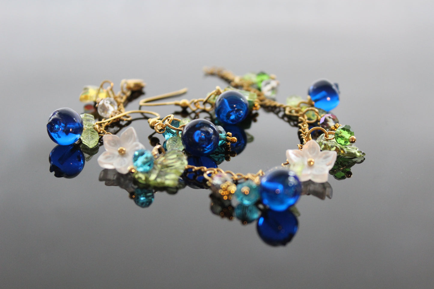 Handmade blueberry jewelry with hypoallergenic gold plated stainless steel hardware and resin glass beads