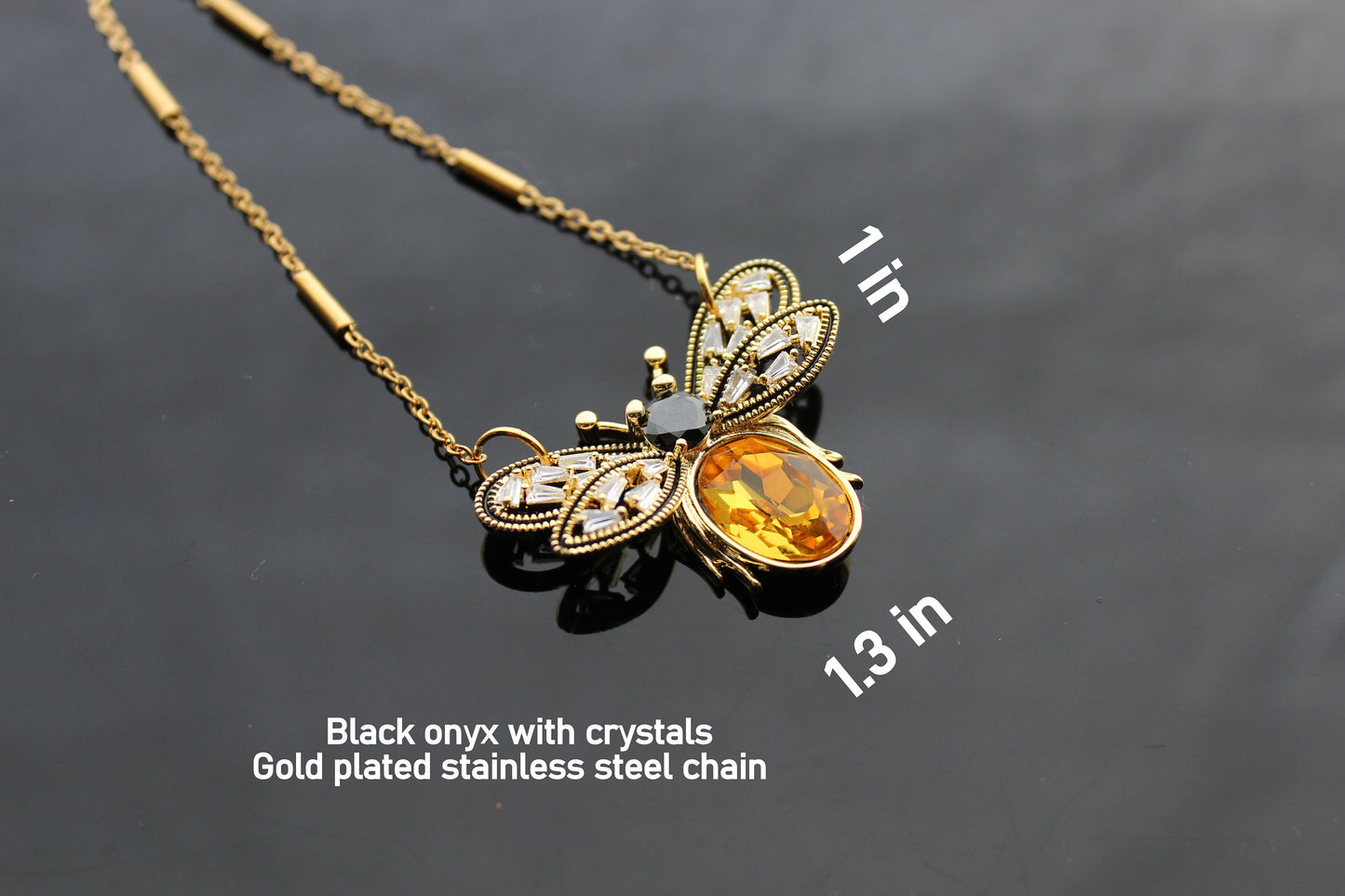 Gold plated bee pendant with natural onyx and crystals