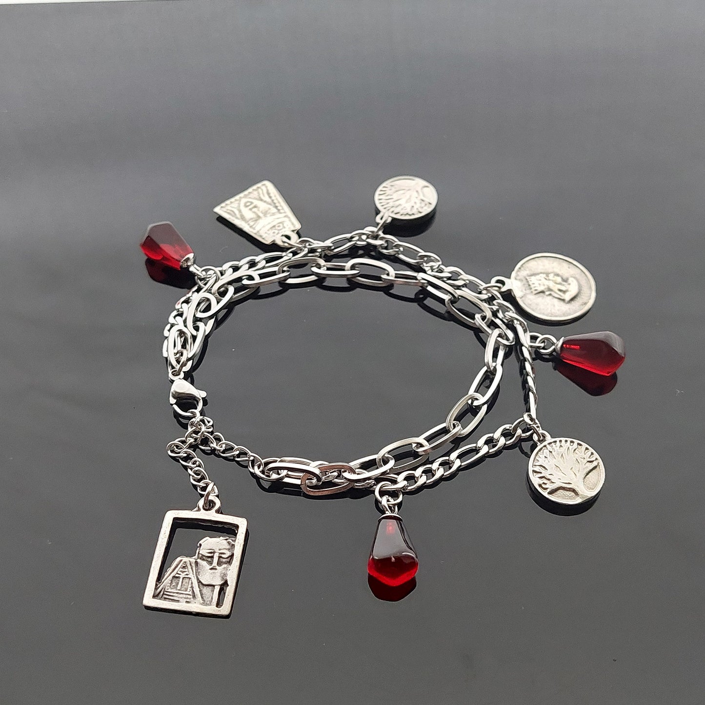 Armenian bangle with pomegranate seeds and charms