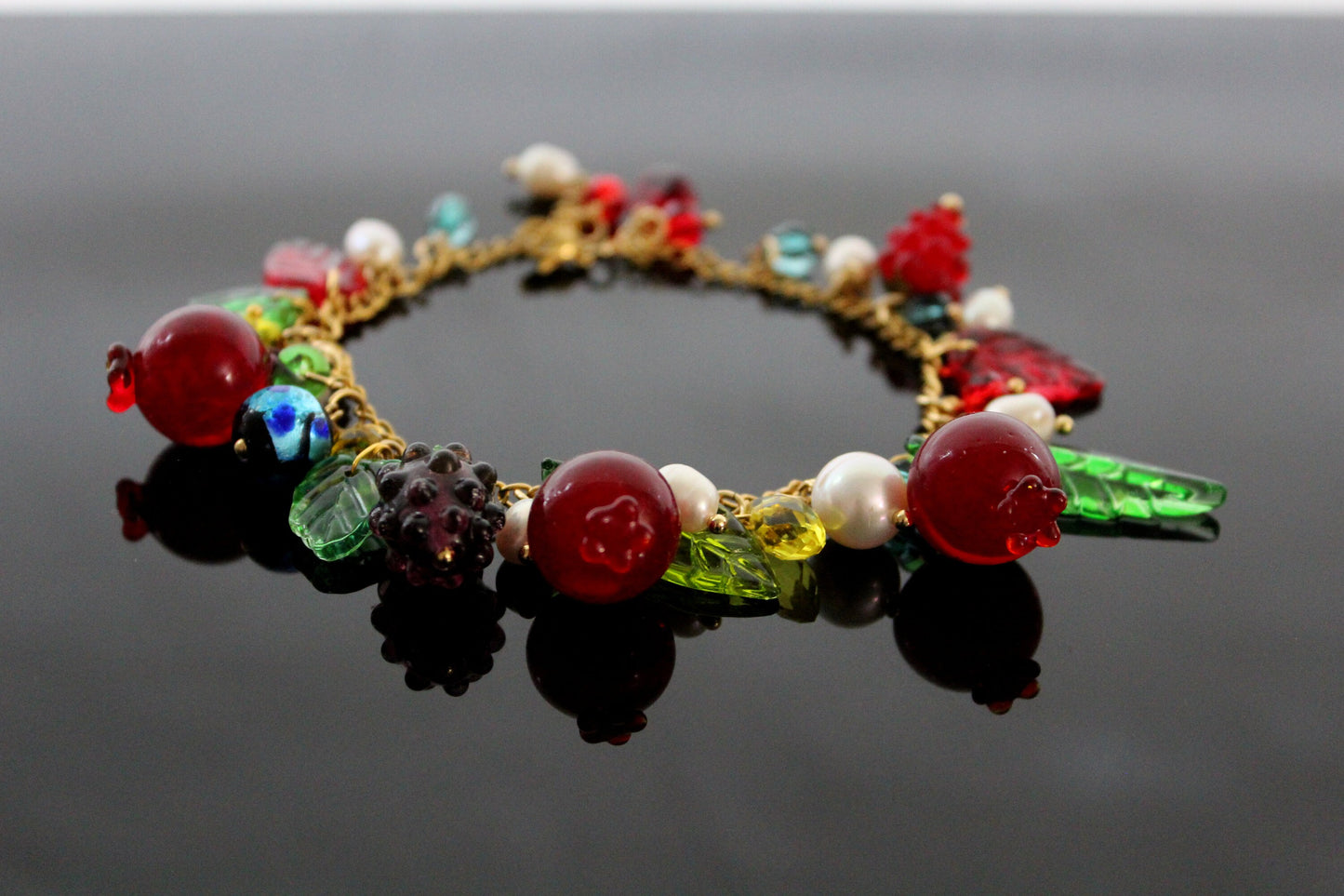 Glass charms, adjustable up to 9 in  gold  plated stainless steel pomegranate bracelet