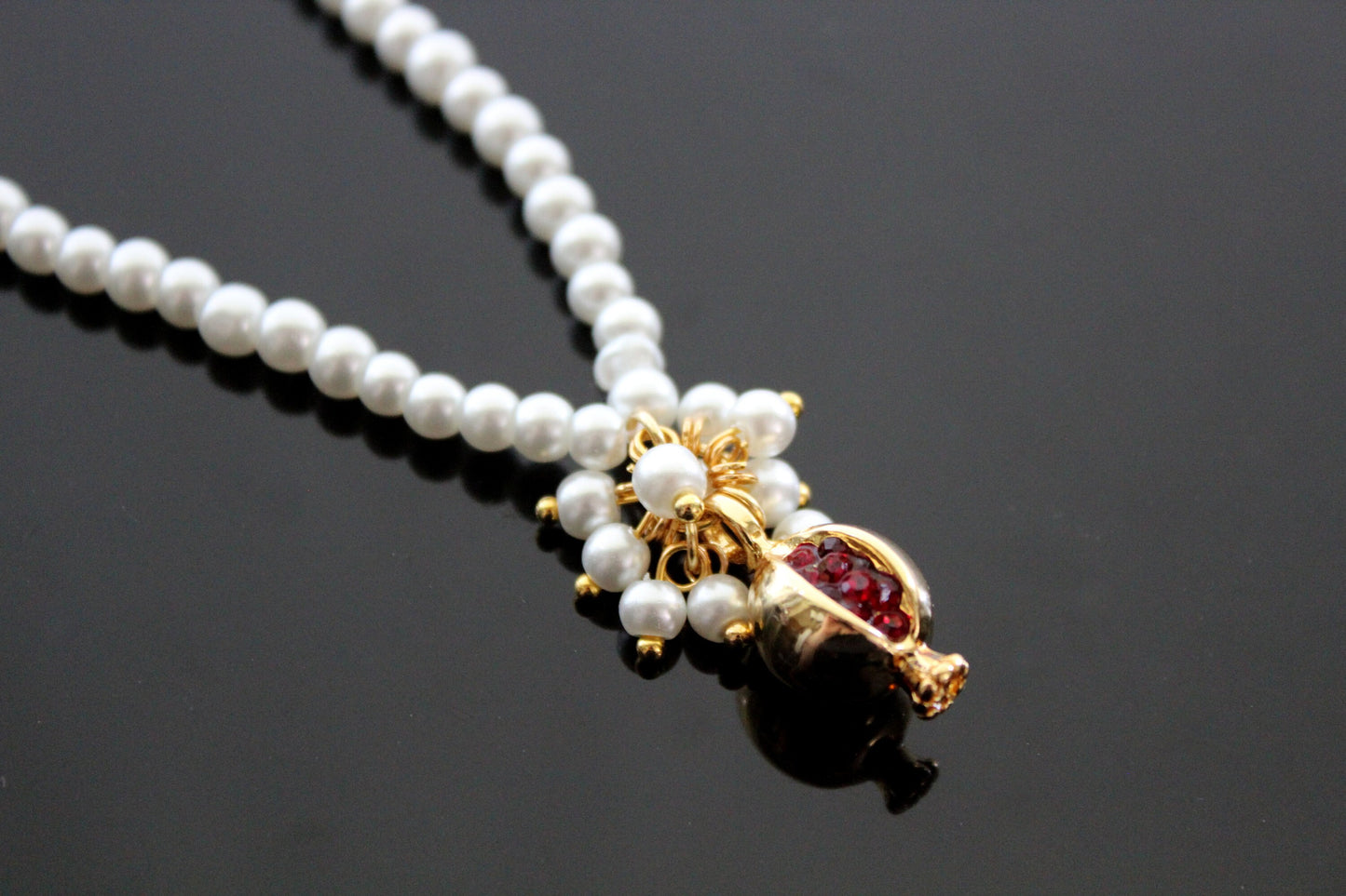 Gold plated pomegranate earrings with red zircons ang glass pearl stand choker