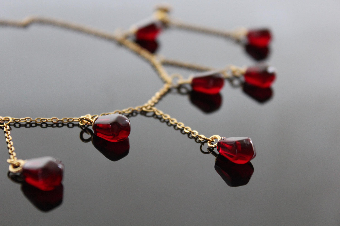 14K gold plated stainless steel Pomegranate resin seed Cascade shape necklace and long drop earrings