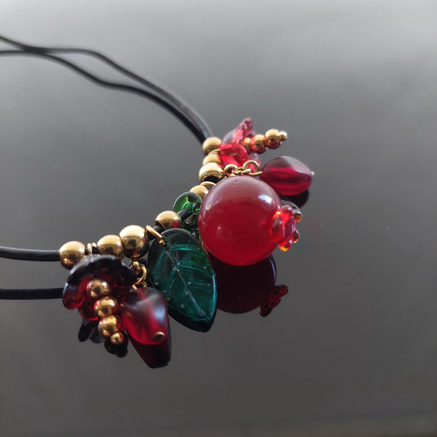 Handmade Pomegranate and floral glass beads with adjustable leather cord
