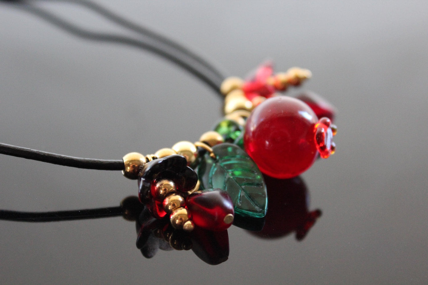 Handmade Pomegranate and floral glass beads with adjustable leather cord
