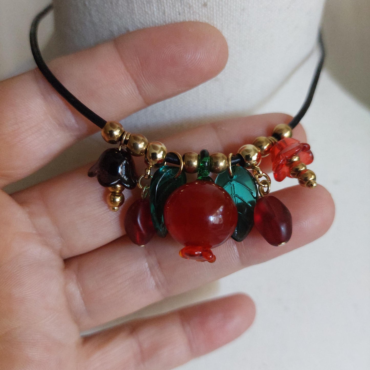 Handmade Pomegranate and floral glass beads with adjustable leather cord