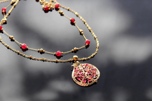 Pomegranate pendant with zircons and glass beads and stainless steel chain