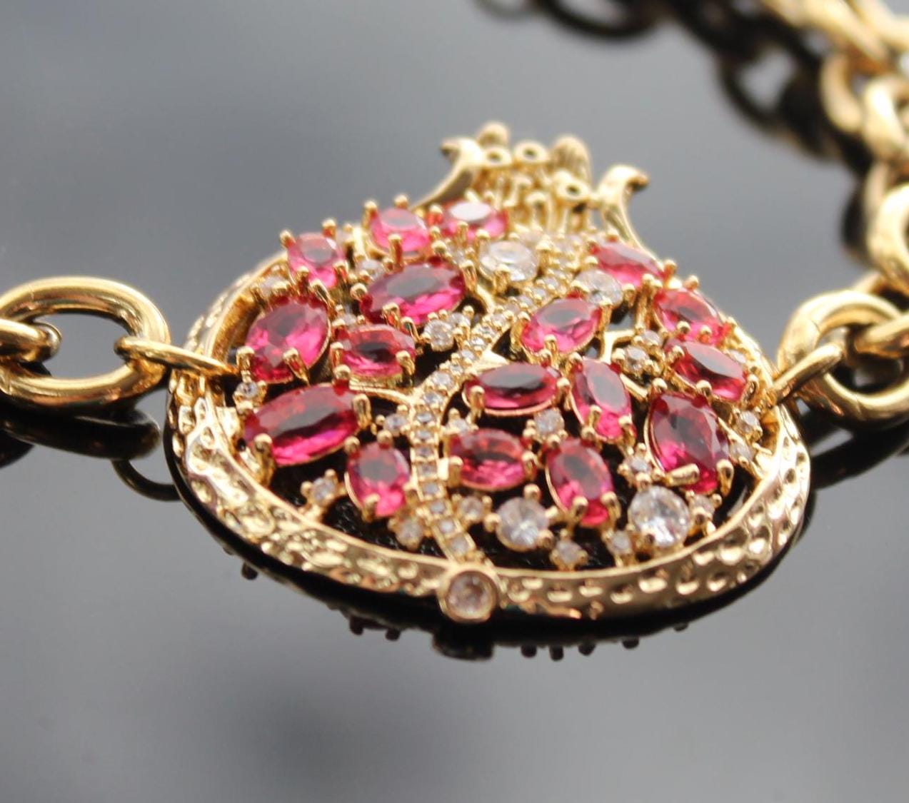 Adjustable 14K gold plated stainless steel pomegranate bracelet with crystals and zircons