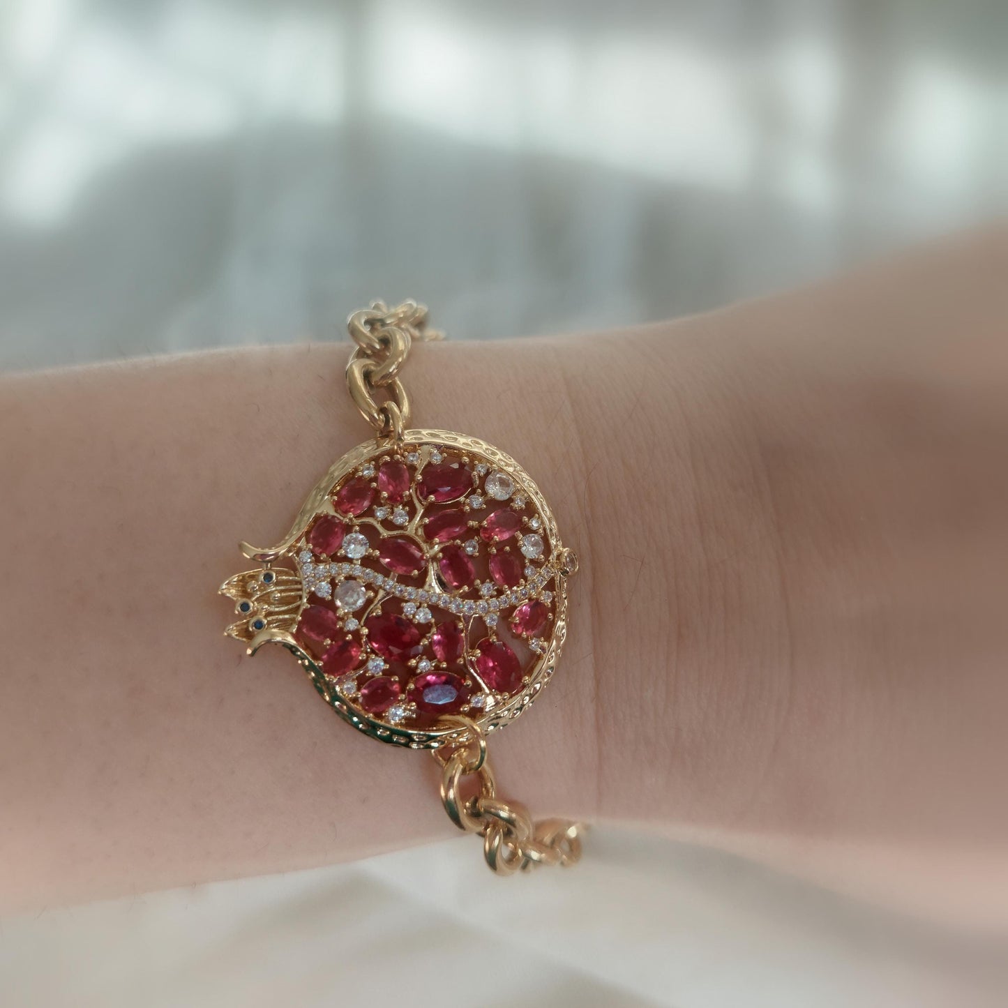 Adjustable 14K gold plated stainless steel pomegranate bracelet with crystals and zircons
