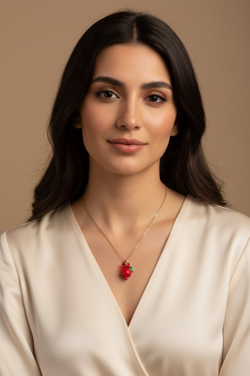 Handmade pomegranate enamel pendant with glass flower and enamel green leaf