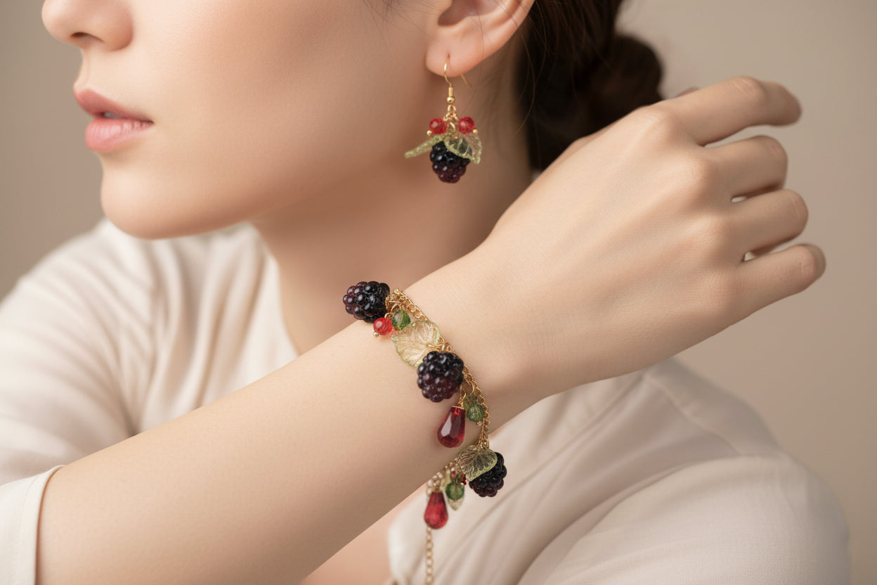 Handmade blackberry  jewelry with hypoallergenic gold plated stainless steel hardware and resin glass beads
