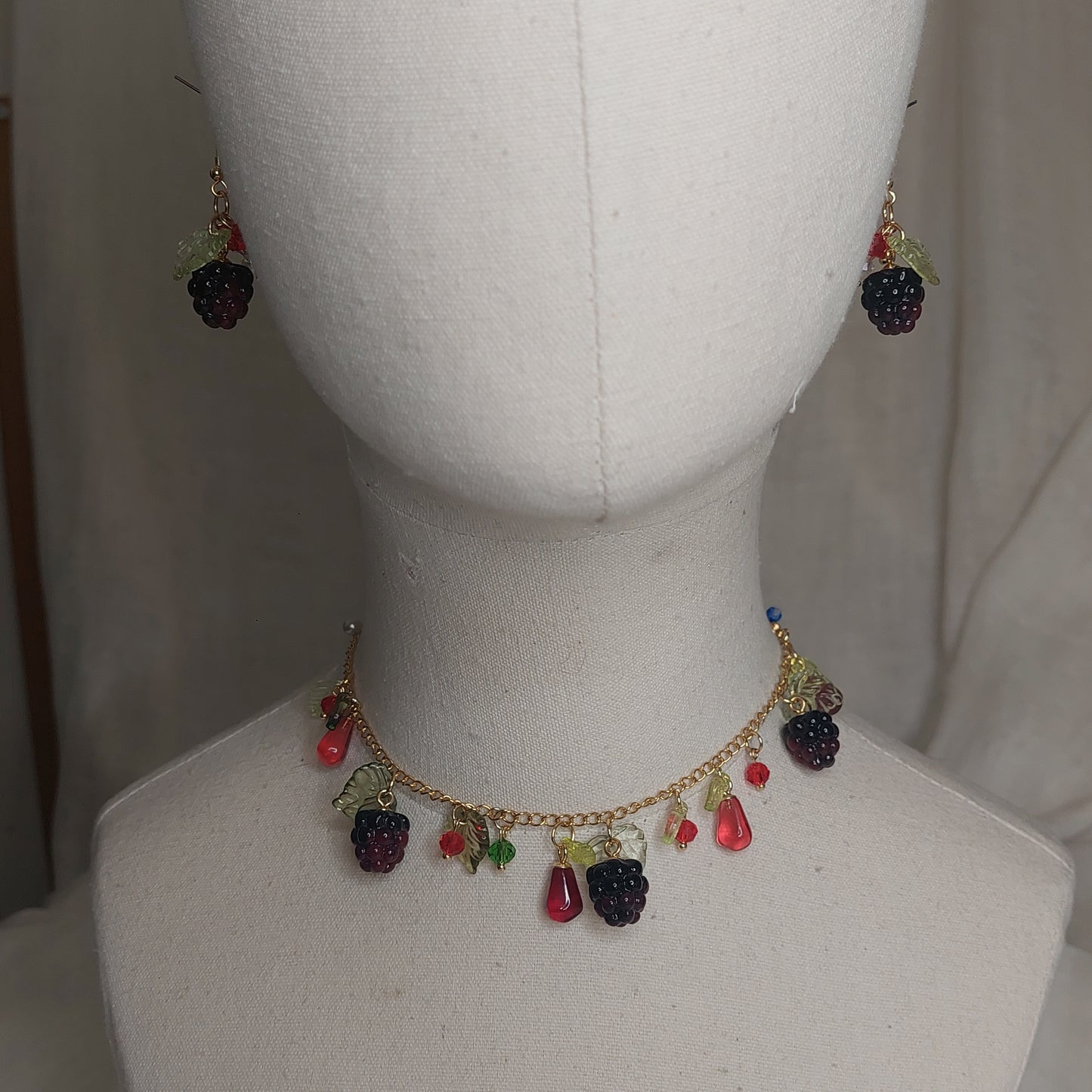 Handmade blackberry  jewelry with hypoallergenic gold plated stainless steel hardware and resin glass beads