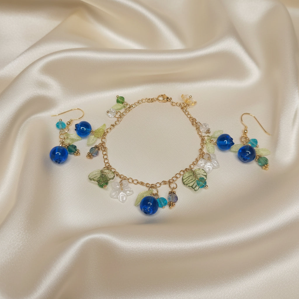 Handmade  blueberry jewelry with hypoallergenic gold plated stainless steel hardware and resin glass beads