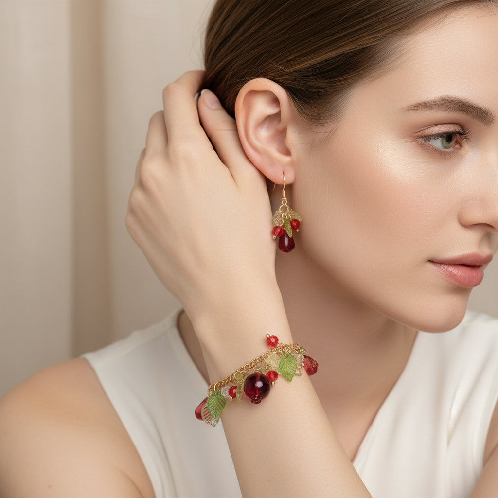 Handmade pomegranate jewelry with hypoallergenic gold plated stainless steel hardware and resin glass beads