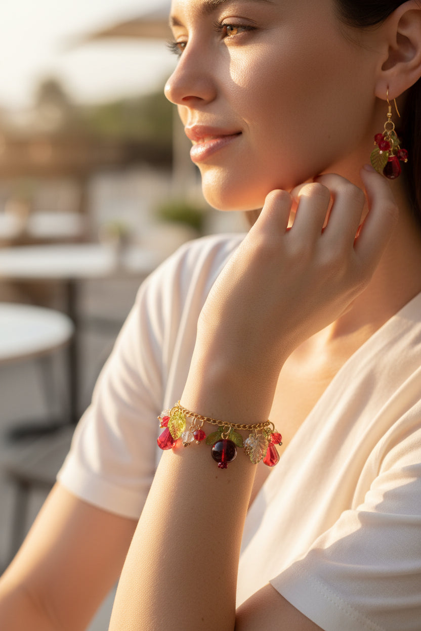 Handmade pomegranate jewelry with hypoallergenic gold plated stainless steel hardware and resin glass beads