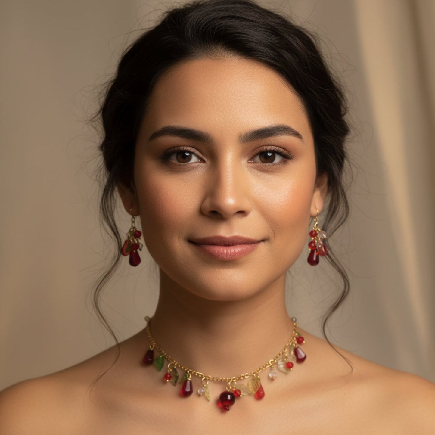 Handmade pomegranate jewelry with hypoallergenic gold plated stainless steel hardware and resin glass beads