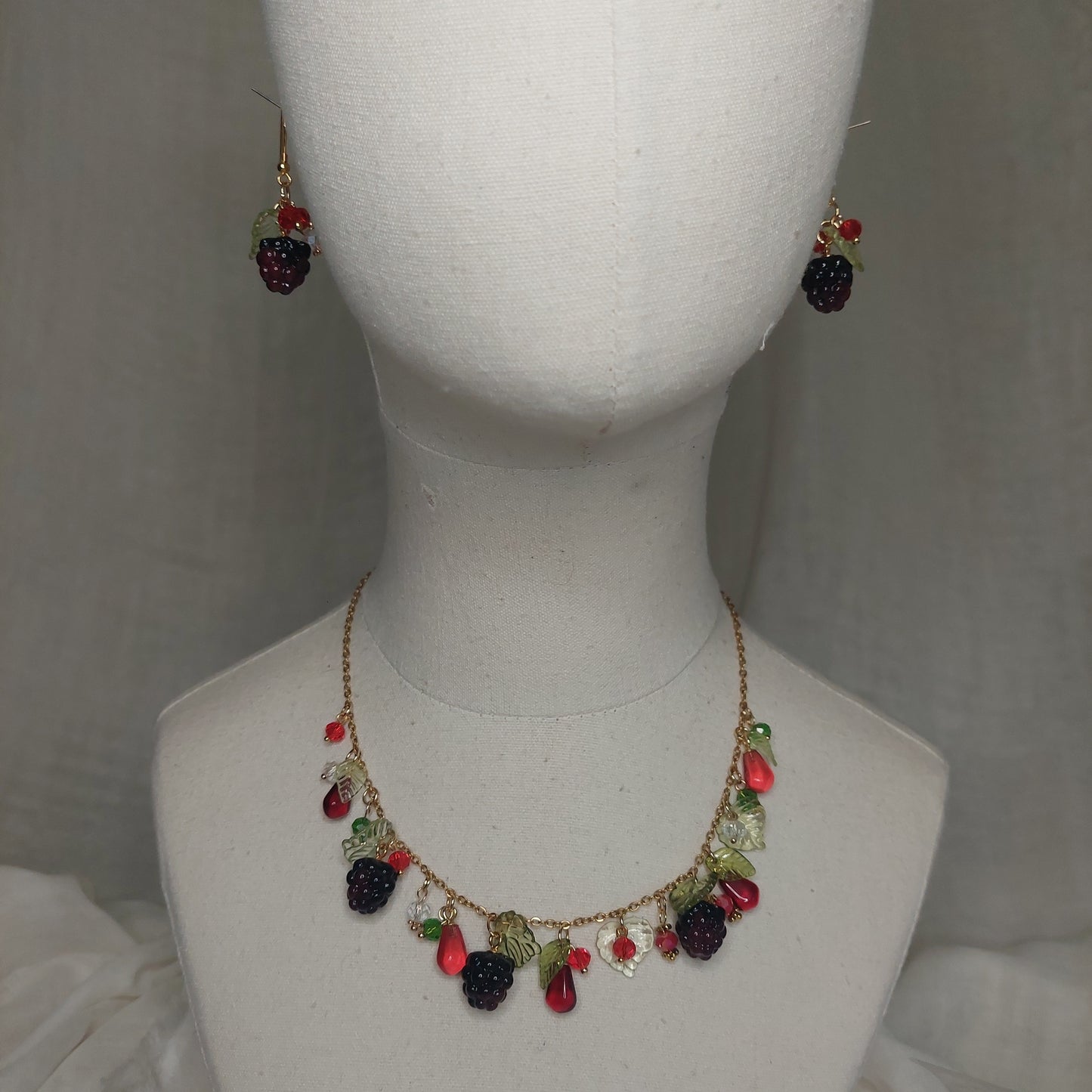 Handmade blackberry  jewelry with hypoallergenic gold plated stainless steel hardware and resin glass beads