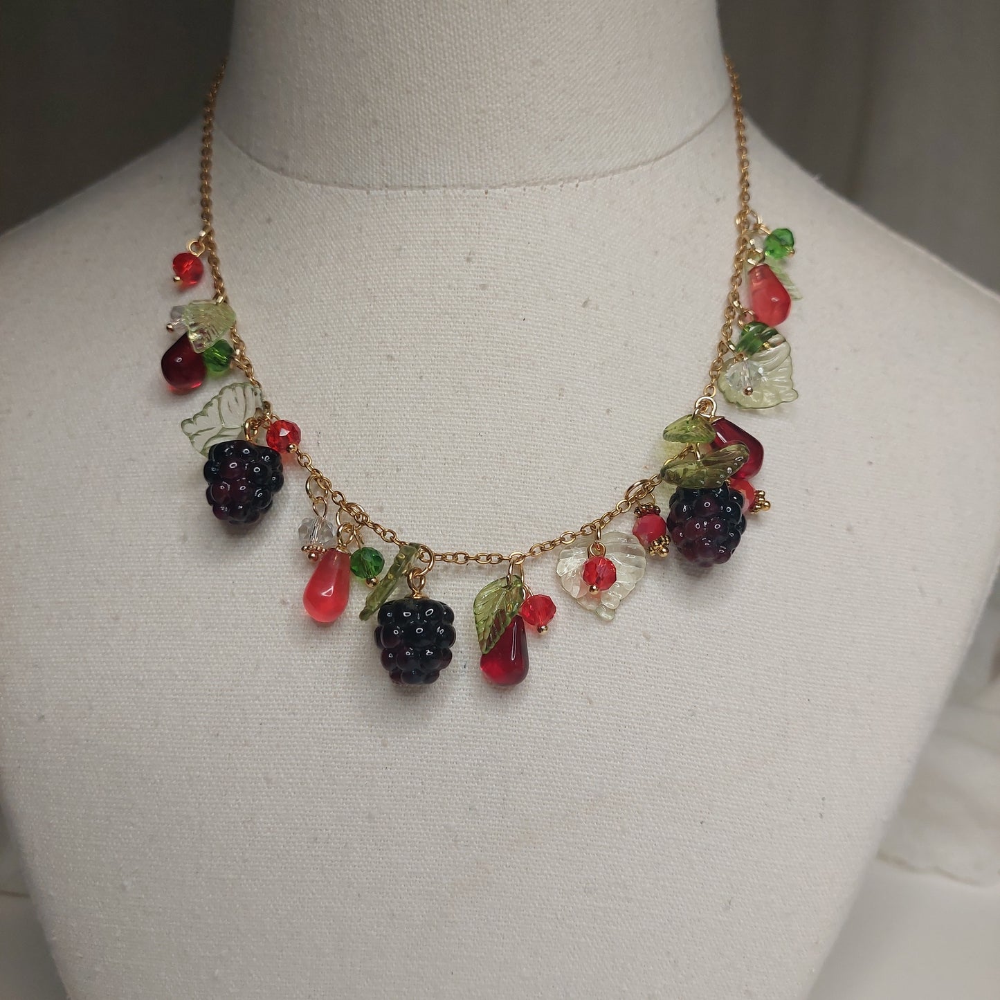 Handmade blackberry  jewelry with hypoallergenic gold plated stainless steel hardware and resin glass beads