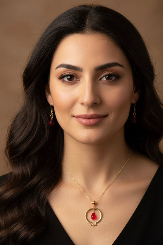 Pomegranate-shaped pendant and delicate matching earrings with glass beads