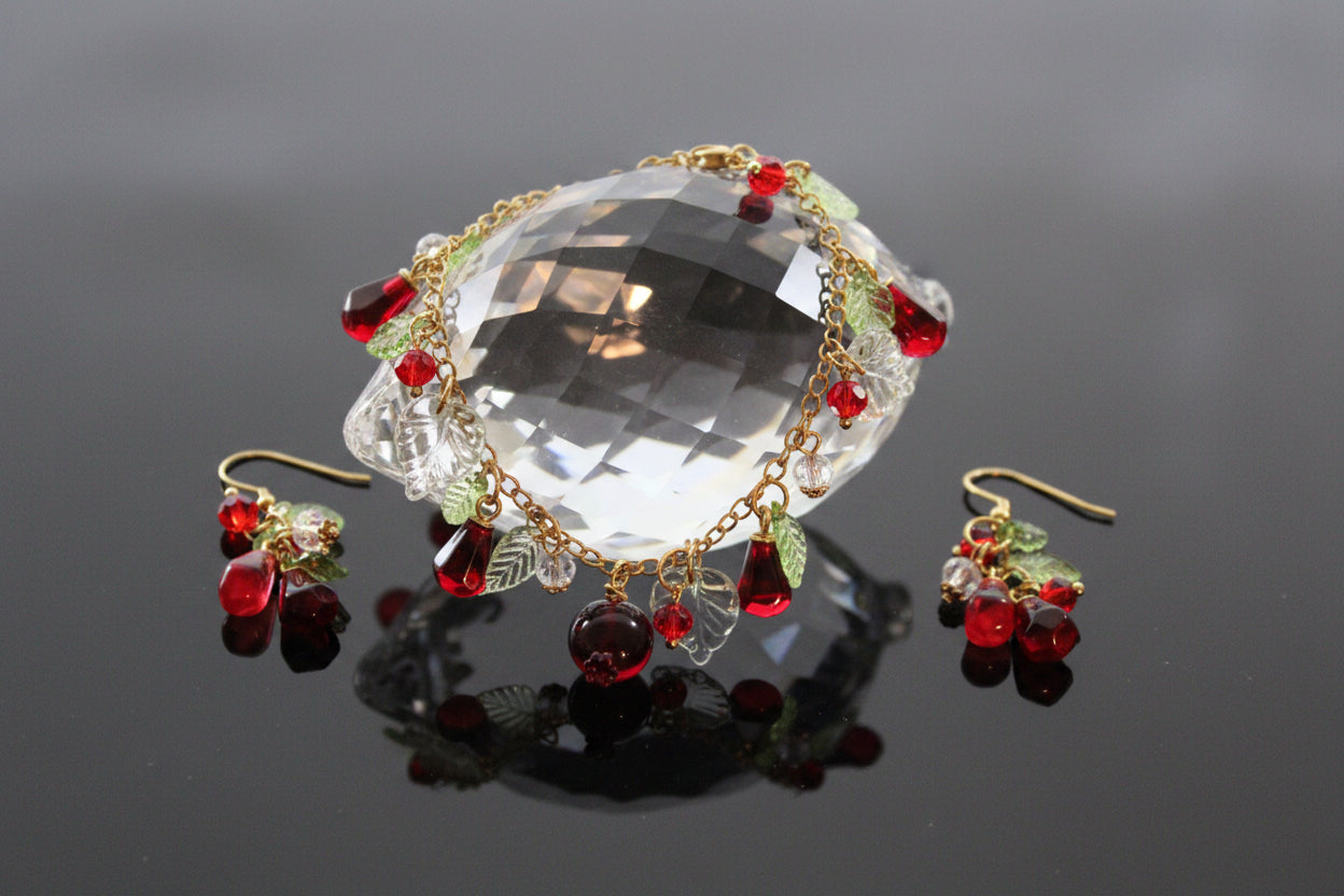 Handmade pomegranate jewelry with hypoallergenic gold plated stainless steel hardware and resin glass beads