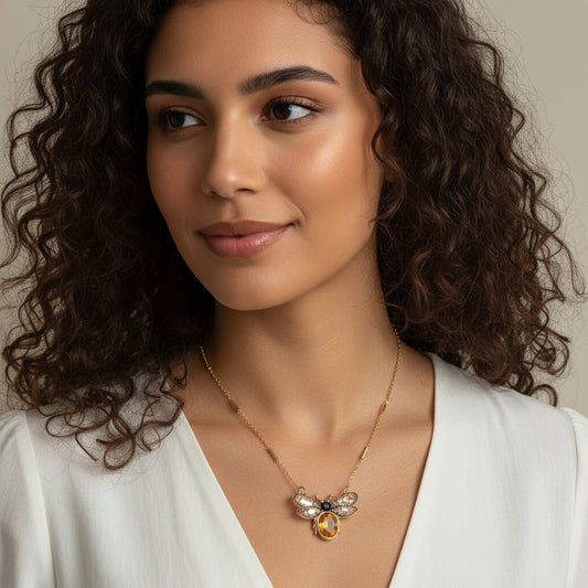 Gold plated bee pendant with natural onyx and crystals
