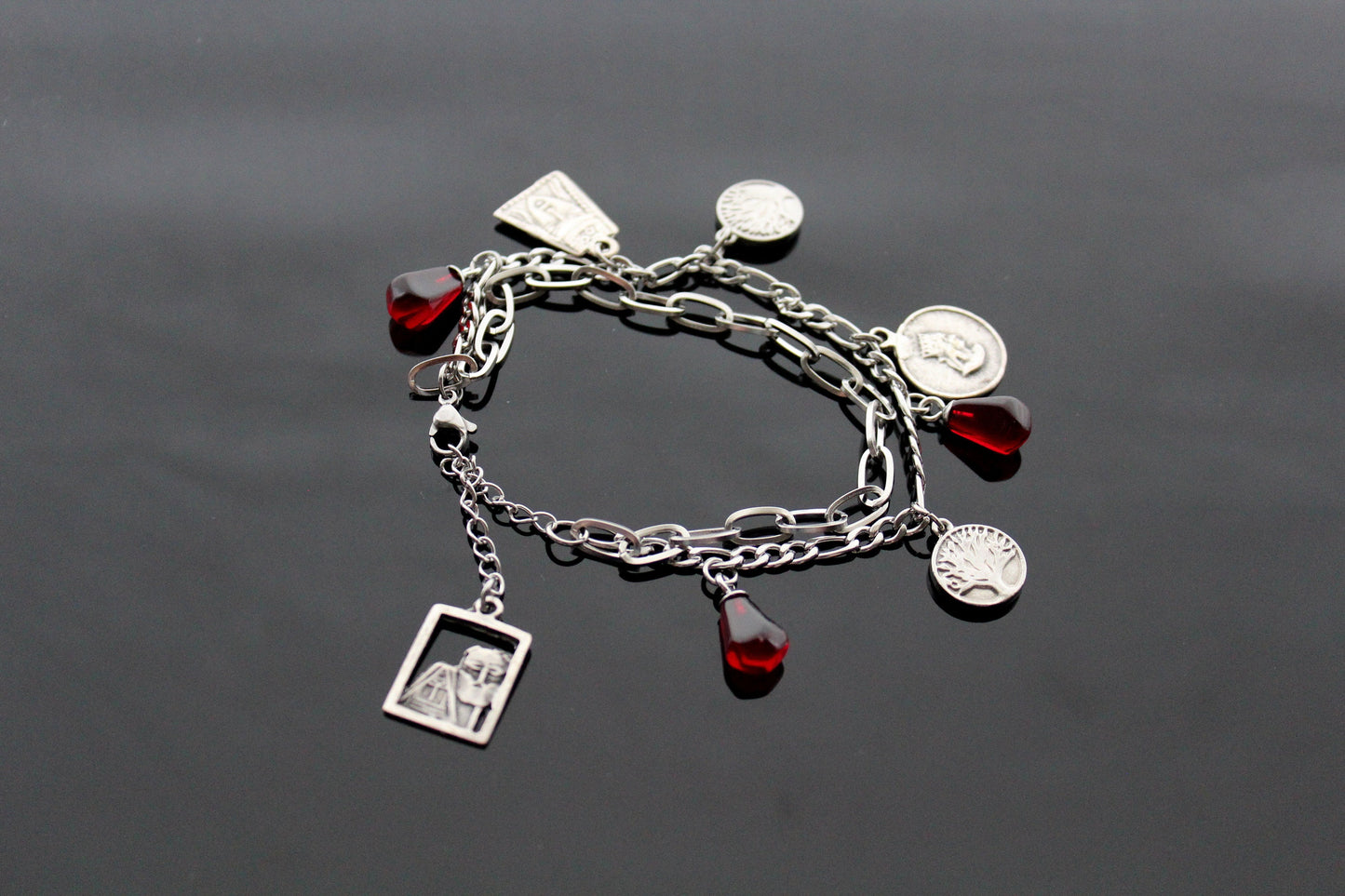 Armenian bangle with pomegranate seeds and charms