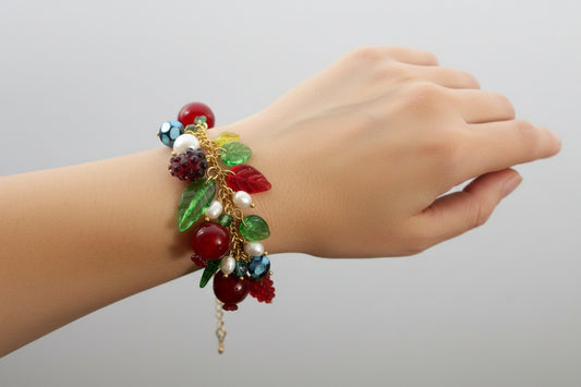 Glass charms, adjustable up to 9 in  gold  plated stainless steel pomegranate bracelet