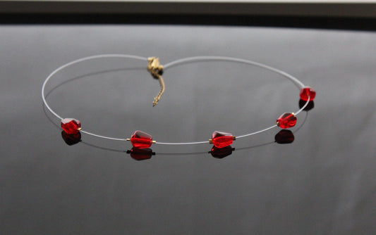 Pomegranates resin seeds on see-through wire
