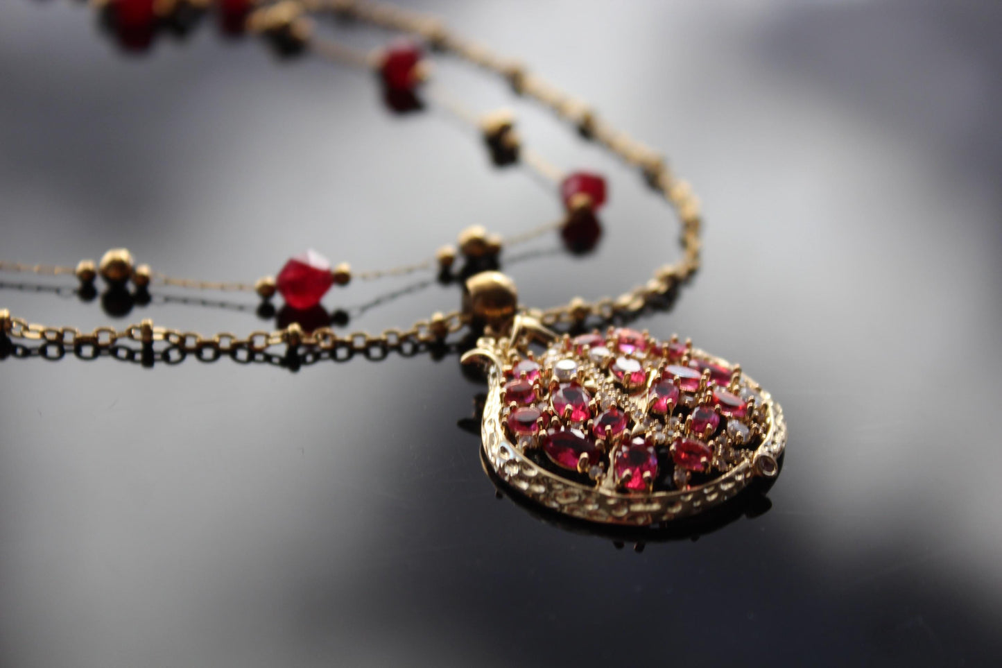 Pomegranate pendant with zircons and glass beads and stainless steel chain