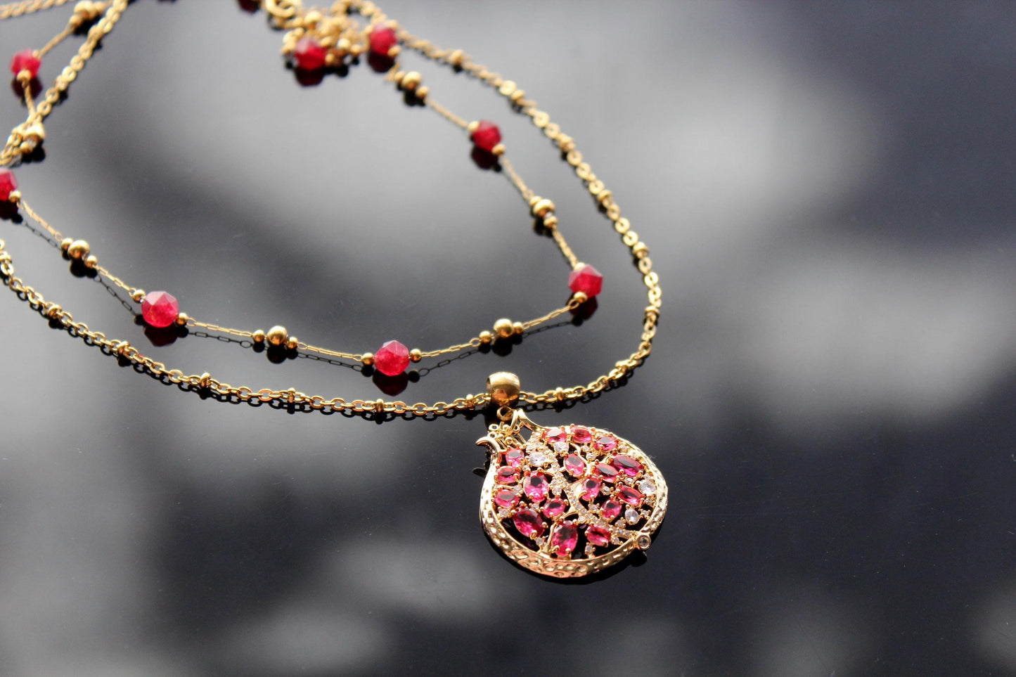 Pomegranate pendant with zircons and glass beads and stainless steel chain